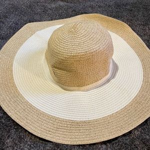 Tan and cream wide brim sun hat. Excellent condition